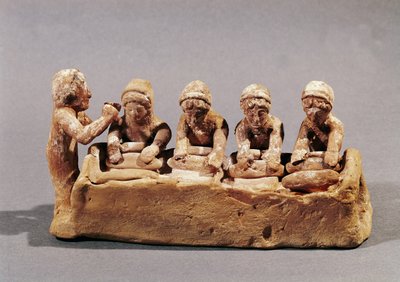 Bakers kneading dough to the sound of a flute, found at Thebes, Boeotia by Greek